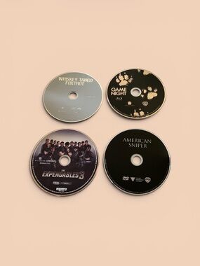 Set of Four Black and Silver Movie Discs — Mixed Titles